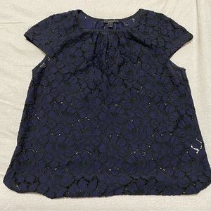 Navy blue lace blouse with black trim